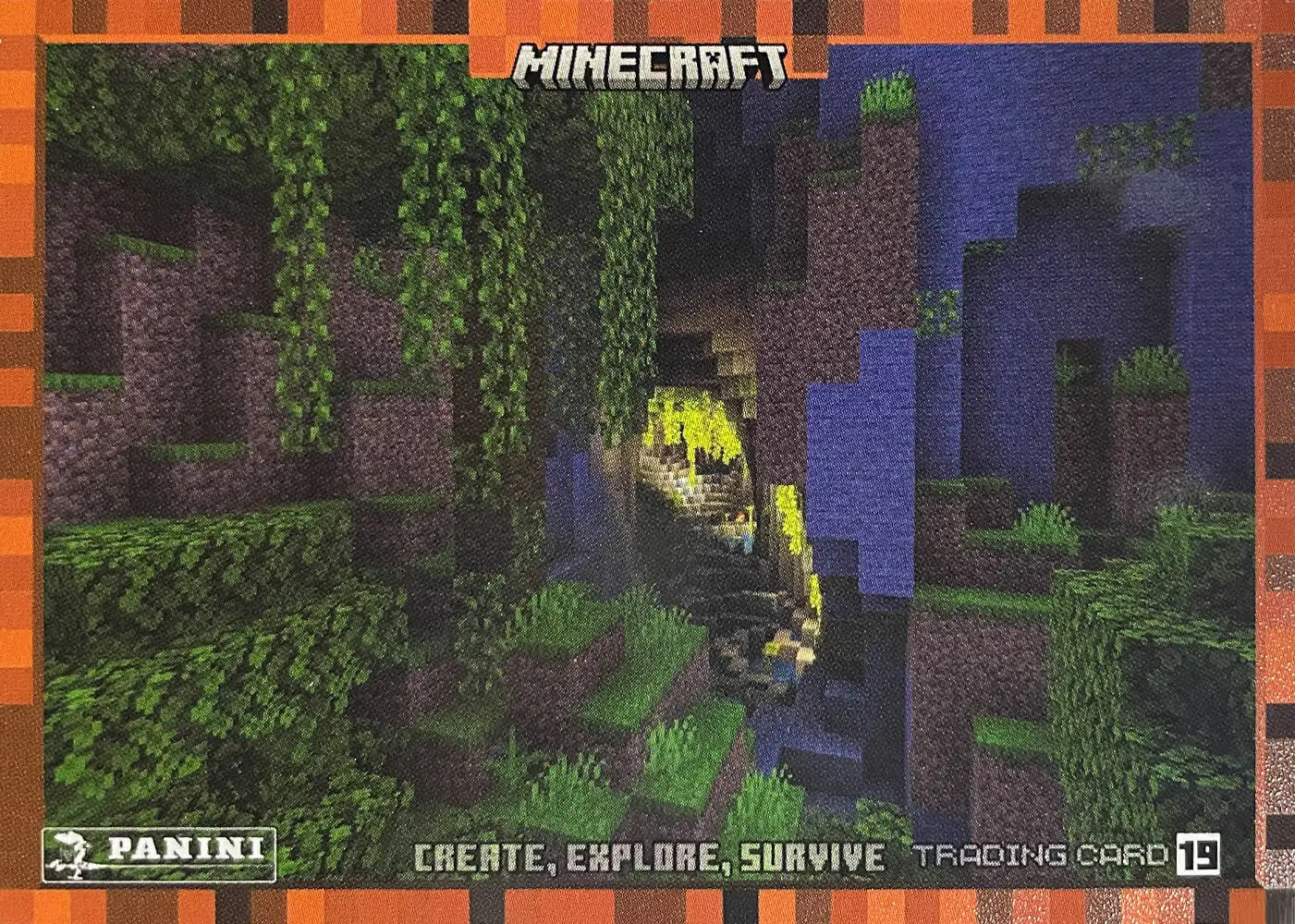 A verdant cavern nestled inside a mountain's core card front