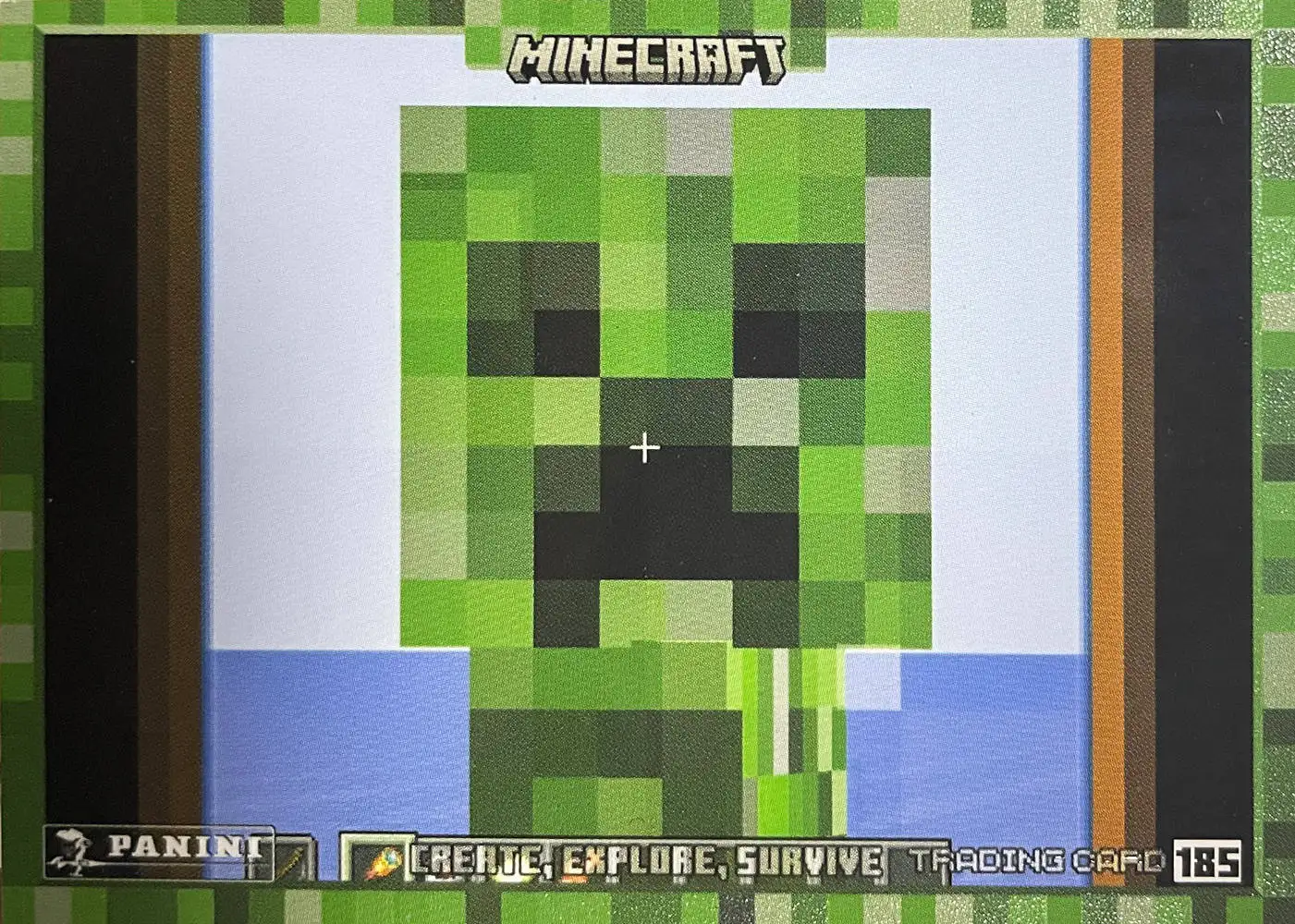 Boo! A creeper pops into his field of view, looking huge through the spyglass... card front